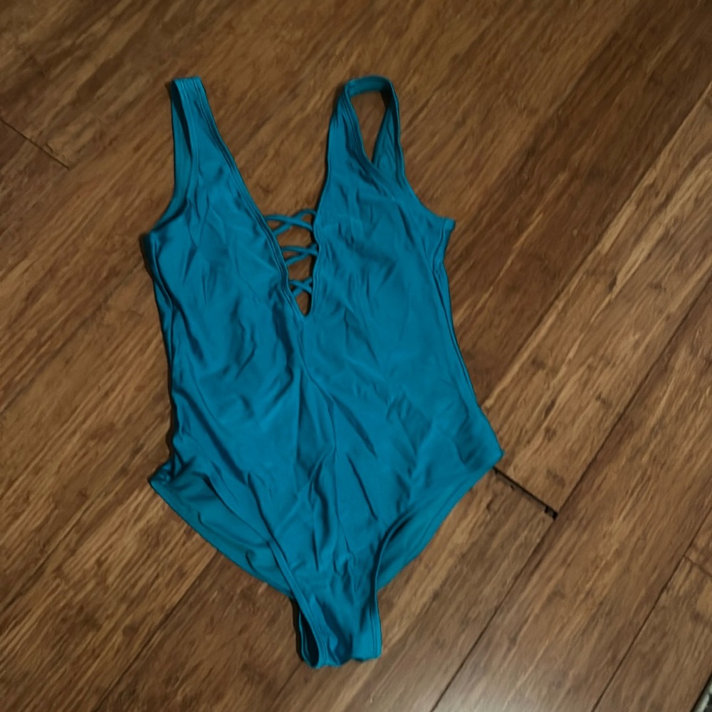 Primark aqua blue body suit, worn once. Size 4
